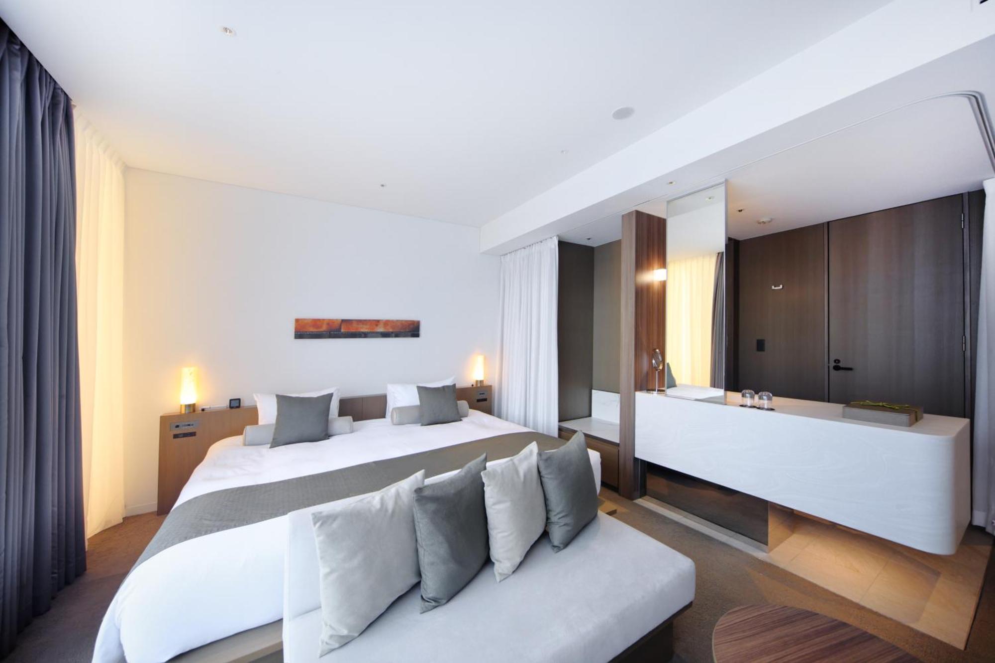 더 로얄 파크 호텔 아이코닉 교토 외부 사진 A bedroom at the hotel